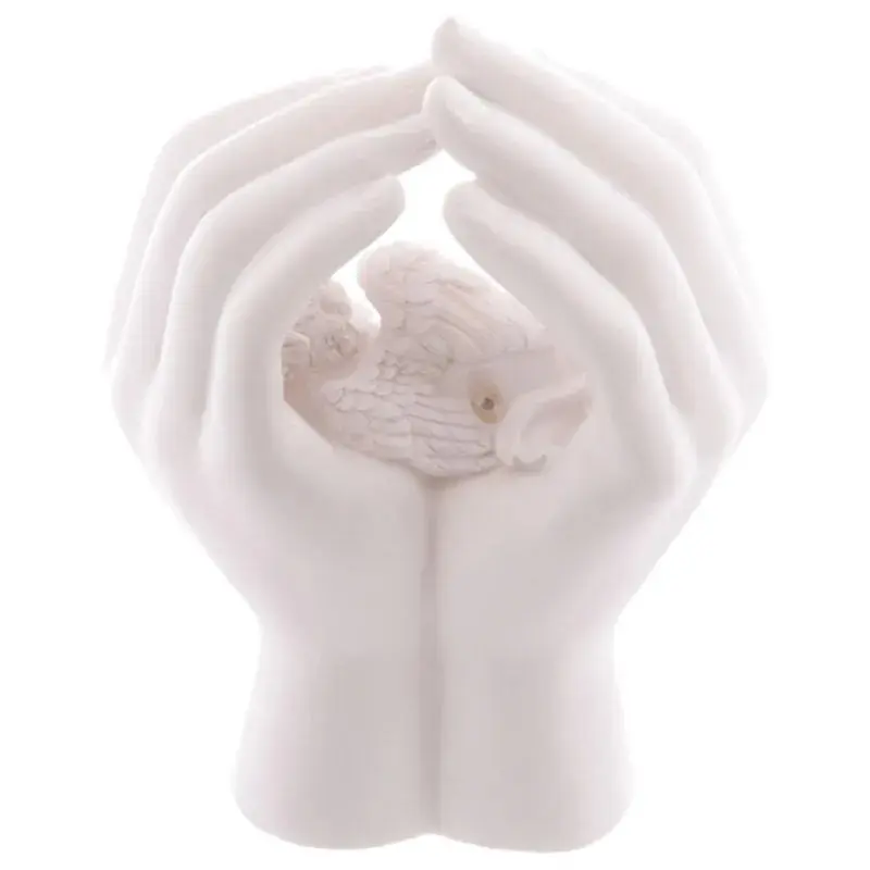 Veilleuse ange dormant dans des mains avec LED Puckator