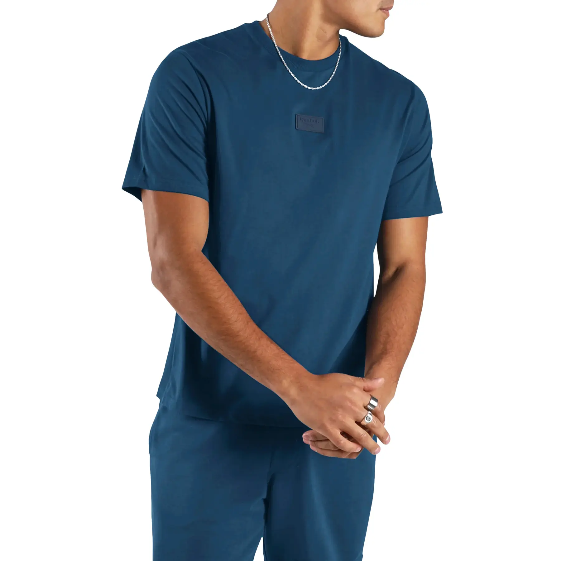 T-shirt con badge in silicone